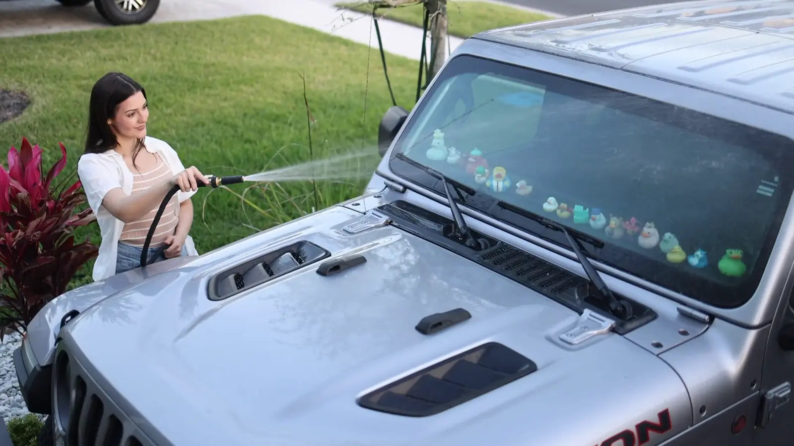 Titan hose being used to wash a vehicle